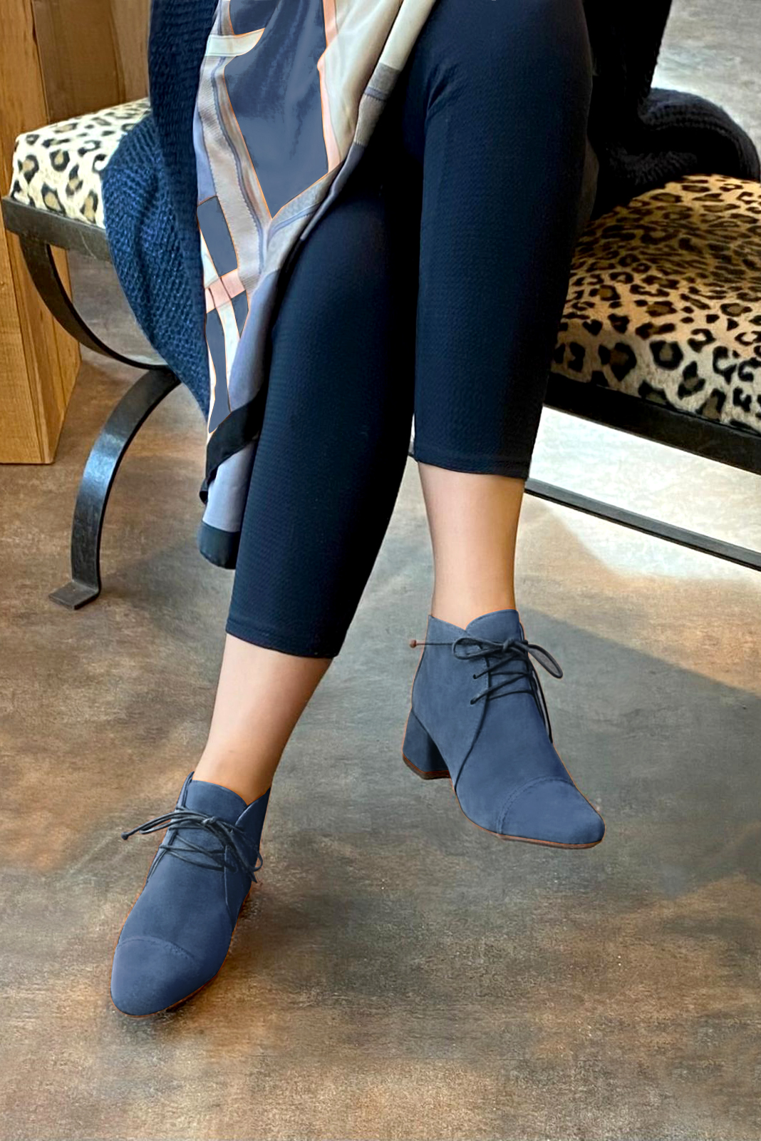 Denim blue women's ankle boots with laces at the front. Round toe. Low flare heels. Worn view - Florence KOOIJMAN